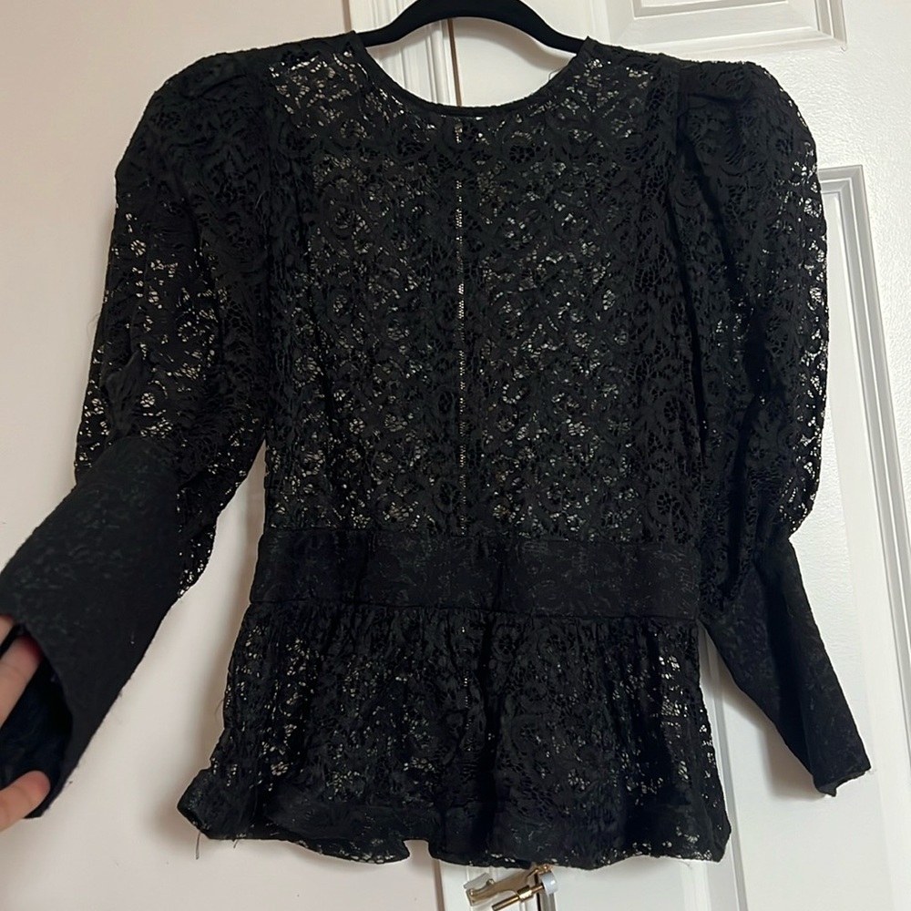 Lace peplum top with zipper back and puffy sleeves